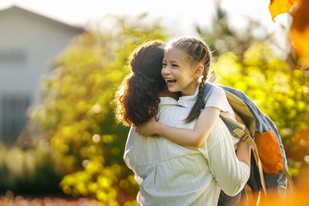 Mother picking up child from school